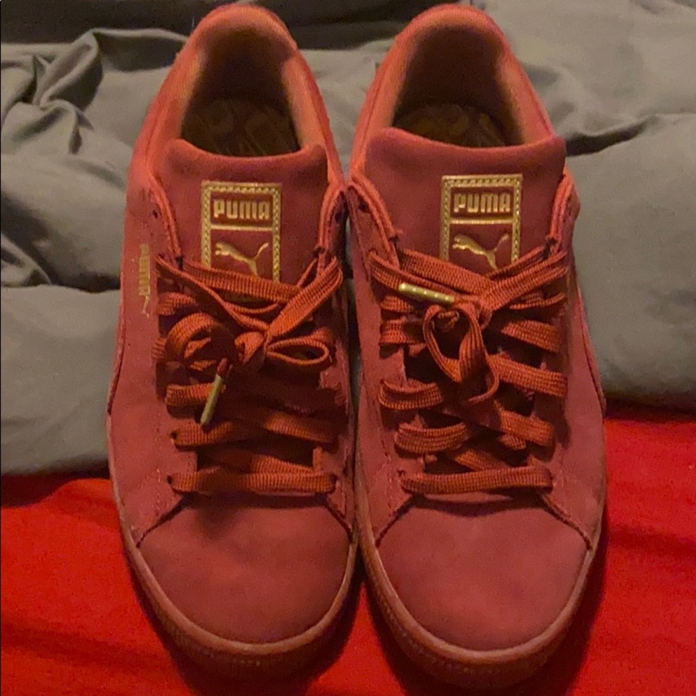 Maroon and gold puma sneakers
